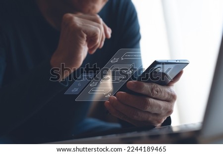 Digital chatbot, robot application, conversation assistant, AI Artificial Intelligence, customer service concept. Man using mobile smart phone with digital chatbot, contact us interface, Chat GPT  Royalty-Free Stock Photo #2244189465