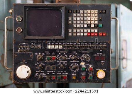 old lathe machine manual control panel with many button switch for metal CNC production data Royalty-Free Stock Photo #2244211591