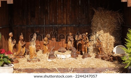 Nativity scene with figures made out of wood is a depiction of the birth of Jesus. Mi'ilya village, Israel.