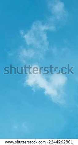A beautiful background of blue sky with white cloud