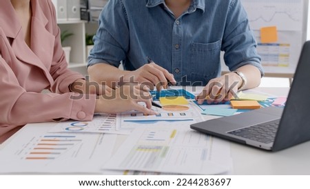 Closeup hand asia people small team talk work on SEO paper chart graph data reskill upskill class hybrid office course. Asian man woman sharing job career idea advice budget report project on laptop. Royalty-Free Stock Photo #2244283697