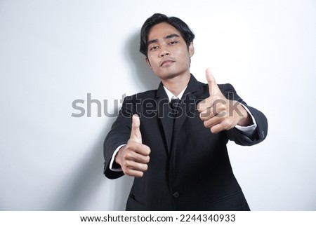 Businessman hand giving thumbs up isolated on white background. gesturing hand OK isolated on white. business man with thumb up over white background