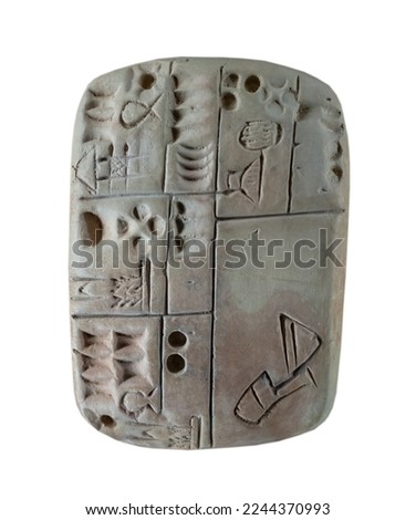 Cuneiform tablet isolated on white Royalty-Free Stock Photo #2244370993