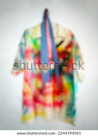 this is a colorful dress with a blur background