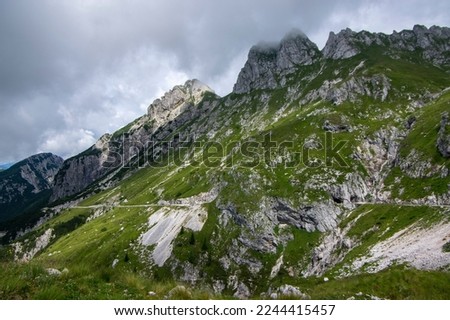 Mala Spice Cime Verdi peaks on Mangart saddle, Slovenia's Highest Panoramic Road, heavy clouds before summer rain