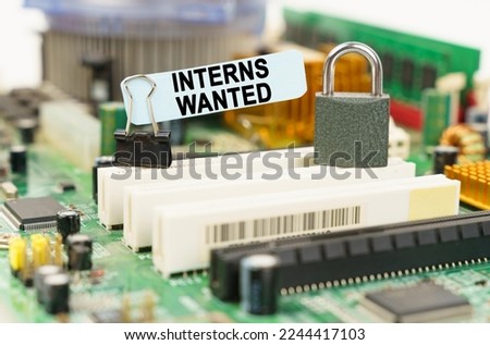 Computer security concept. There is a sticker on the motherboard that says - Interns Wanted