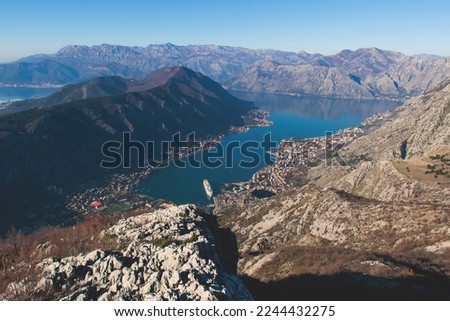 The Bay of Kotor, Beautiful aerial view of Boka Kotorska, with Kotor, Herceg Novi and Tivat municipalities in a sunny day, Adriatic sea and Dinaric Alps with Lovcen and Orjen mountains, Montenegro Royalty-Free Stock Photo #2244432275