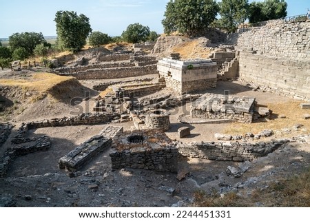 The ruins (Remains) of the ancient Greek city of Troy (Troia) are in the archaeological park of Troy (Truva), near Çanakkale province in Western Turkey. Royalty-Free Stock Photo #2244451331