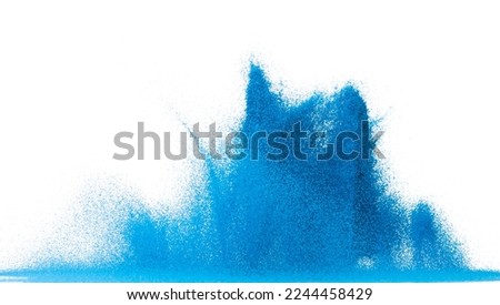 Small size blue Sand flying explosion, Ocean sands grain wave explode. Abstract cloud fly. Blue colored sand splash throwing in Air. White background Isolated high speed shutter, throwing freeze stop