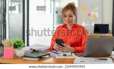 Photo of successful concentrated boss use modern gadget macbook email chat write notes weekly plan report office room indoor workstation