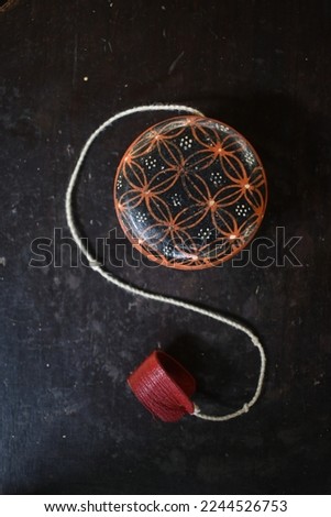 Indonesian traditional toy made of wood called Yoyo