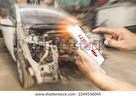 emergency call car accident and repair, Hand use smartphone call appeal for aid and blurry car background.