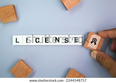 letters of the alphabet with the word license. concept of licensing law. driving license. business license