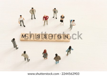 The word mission written on wooden cubes over white background