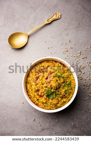 Millet Khichdi or bajra khichadi is a one pot healthy and protein rich gluten-free Indian meal Royalty-Free Stock Photo #2244583439