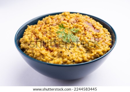 Millet Khichdi or bajra khichadi is a one pot healthy and protein rich gluten-free Indian meal Royalty-Free Stock Photo #2244583445