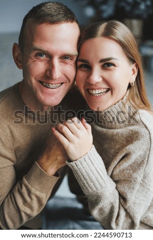 Portrait of a happy smiling couple, hugs of people in love. Emotions of joy and love.