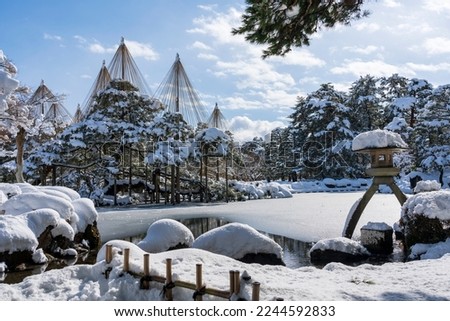 Snow scene of Kenrokuen Garden in Kanazawa City, Ishikawa Prefecture, one of Japan's representative daimyo gardens Royalty-Free Stock Photo #2244592833