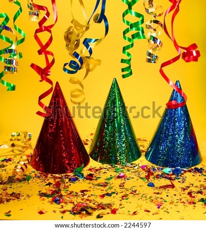 Party hats on a yellow background