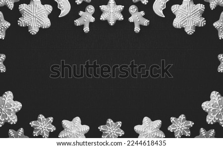 Cozy Christmas gingerbread set frame in black and white style and place for text in the center. Top View. Christmas and a Happy New Year Concept. Monochrome Banner