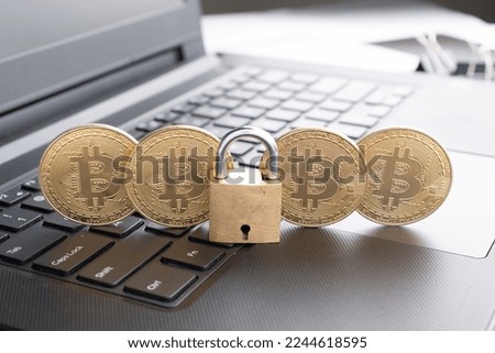 Bitcoin security concept, cryptocurrency with padlock Royalty-Free Stock Photo #2244618595