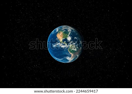 Planet Earth in Space surrounded by Stars. This image elements furnished by NASA.