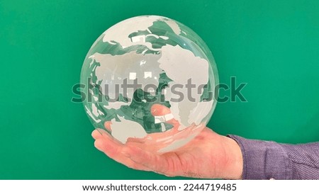 globe in hand green, global earth