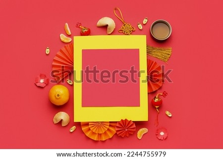 Blank card, fortune cookies and Chinese symbols on red background. New Year celebration