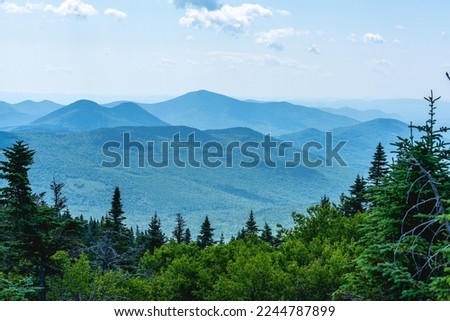 View of New Hampshire mountains from atop Wildcat Mountain Royalty-Free Stock Photo #2244787899