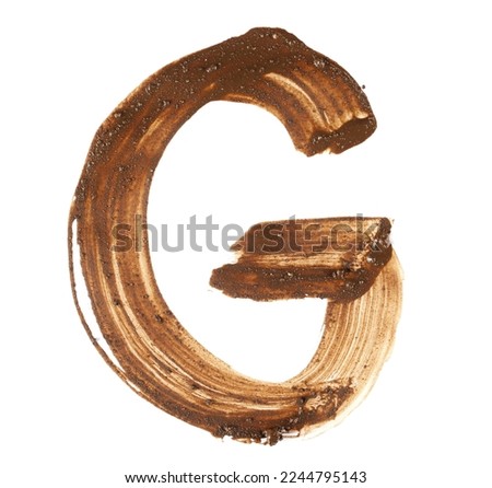 Wet mud alphabet, brush stroke letter G isolated on white, clipping path Royalty-Free Stock Photo #2244795143
