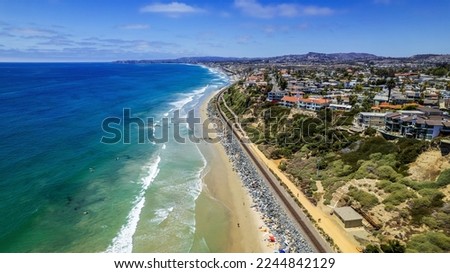 Ariel view of San Clemente Coastline with coastal view homes,  and railroad tracks. Royalty-Free Stock Photo #2244842129