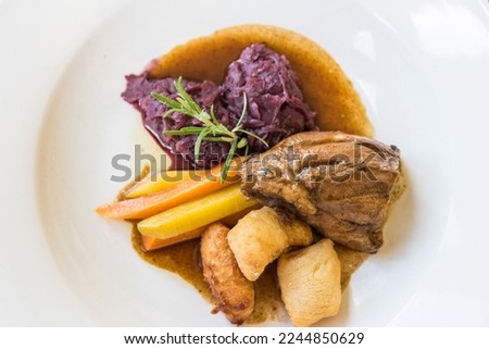 tasty lamb with potato owls and red cabbage lamb