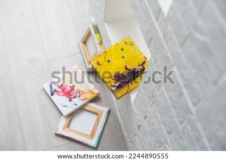 Canvas print. photo with gallery wrap method of canvas stretching on stretcher bar. Sample of stretched color photograph printed on canvas, lateral side, closeup.