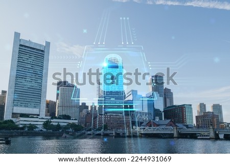 Panorama city view of Boston Harbor at day time, Massachusetts. Building exteriors of financial downtown. Glowing Padlock hologram. Concept of cyber security to protect confidential information