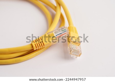 Lan cable internet connection network, rj45 connector ethernet cable. Royalty-Free Stock Photo #2244947957