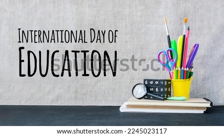 International Day of Education concept with color school supplies on desk. International Education Day, 24 January greeting card. Royalty-Free Stock Photo #2245023117
