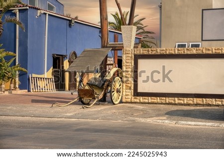 Namibia, Swakopmund, vintage rickshaw parked on the street in front of Indian temple