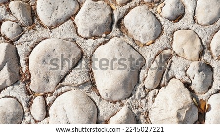 Texture of a stone wall. Part of a stone wall, for background or texture