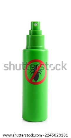 Bottle of lice spray on white background