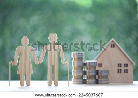 Mutual fund,Love couple senior and model house on natural green background, Save money for prepare in future and pension retirement concept Royalty-Free Stock Photo #2245037687