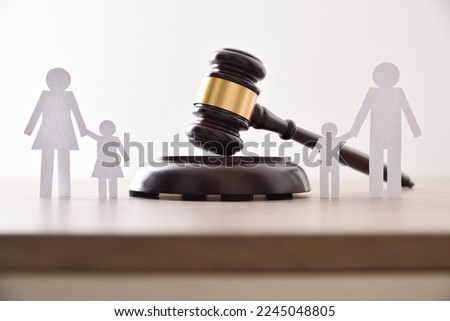 Conflict agreement for the custody of children in a divorce. Front view. Royalty-Free Stock Photo #2245048805