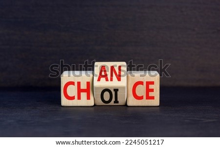 Choice and chance symbol. Concept word Choice Chance on wooden cubes. Beautiful black table black background. Business and choice and chance concept. Copy space.