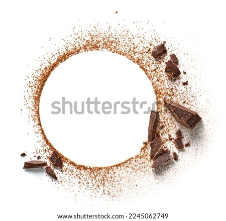 round composition of cocoa and chocolate pieces isolated on white background, top view
