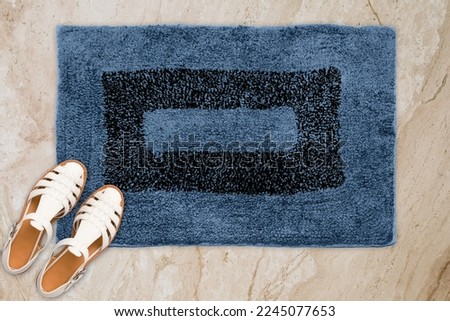 Designer Welcome Entry Doormat Placed on Marble Floor with White Ladies Sandles