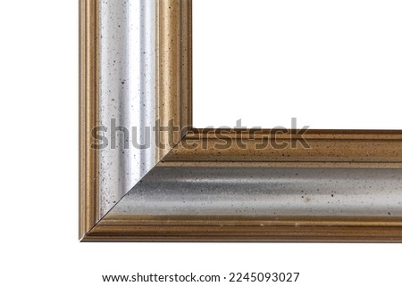 Antique golden and silver frame isolated on white background. Old wooden frame with decor painted with gold and silver paint. Italian heritage and antiquities