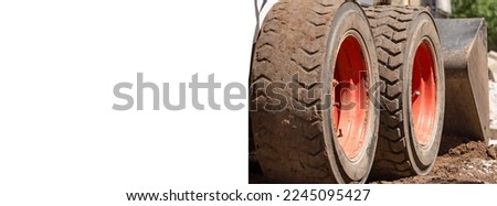 Wheel loader under construction with space for inscription, text, business card.