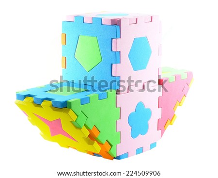 colorful kids puzzle boat with wholes isolated on white background