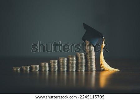 Saving money coin with banking investment, finance education concept. Planning student loan for studying abroad for college or university degree. Future children's education fund cash. Growing saving Royalty-Free Stock Photo #2245115705