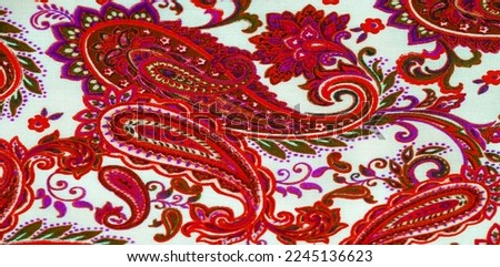 Paisley red pattern on a white background. The pattern is sometimes referred to as "Persian pickles" by American traditionalists, especially patchwork craftsmen, or "Welsh pears" in Wales