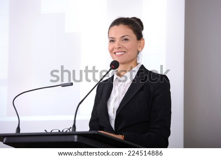 Female speaker at the board. Business conference Royalty-Free Stock Photo #224514886